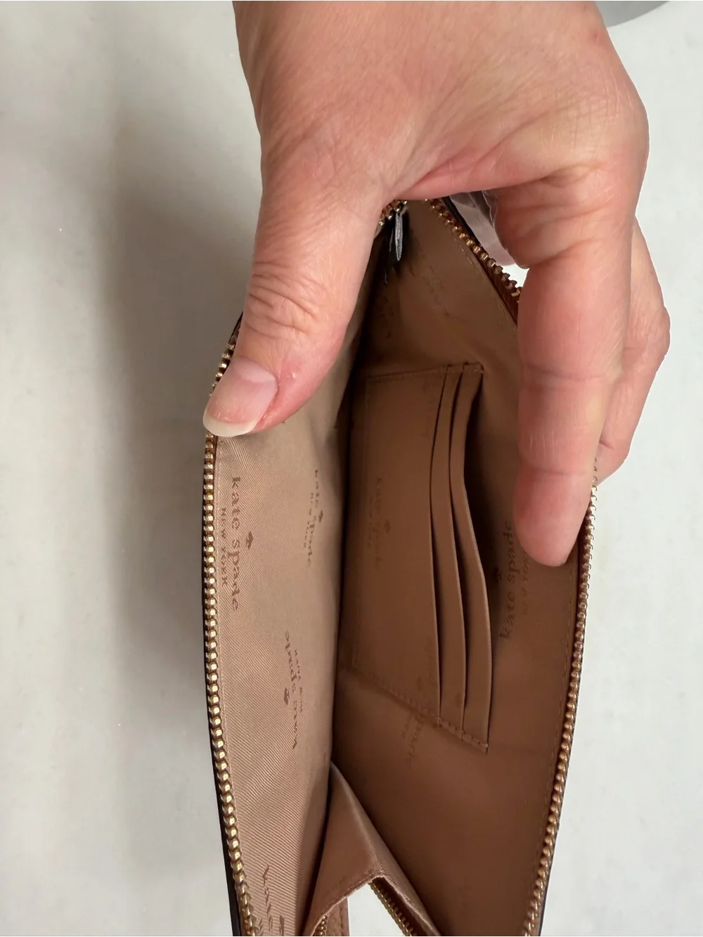kate spade Brown Pebbled Leather Zip Wristlet with Strap